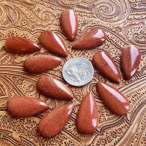 15x30mm Red Goldstone Pear Cab (1 pc)